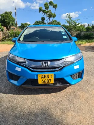 Picture of Hybrid Fuel Savers: Honda Fit Hybrid GP5, Toyota Axio, Toyota Aqua