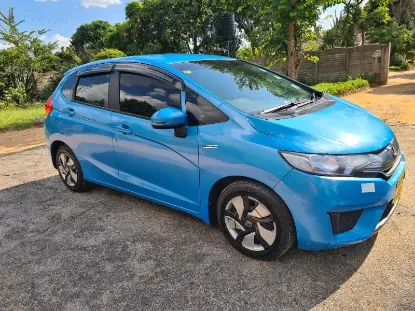 Picture of Hybrid Fuel Savers: Honda Fit Hybrid GP5, Toyota Axio, Toyota Aqua