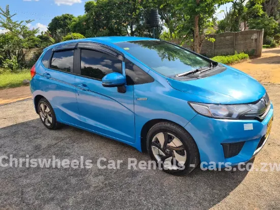 Picture of Hybrid Fuel Savers: Honda Fit Hybrid GP5, Toyota Axio, Toyota Aqua
