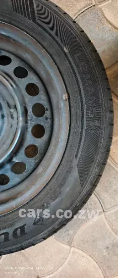 Picture of Brand New Dunlop tyres and rims 185/60 R15