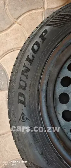 Picture of Brand New Dunlop tyres and rims 185/60 R15